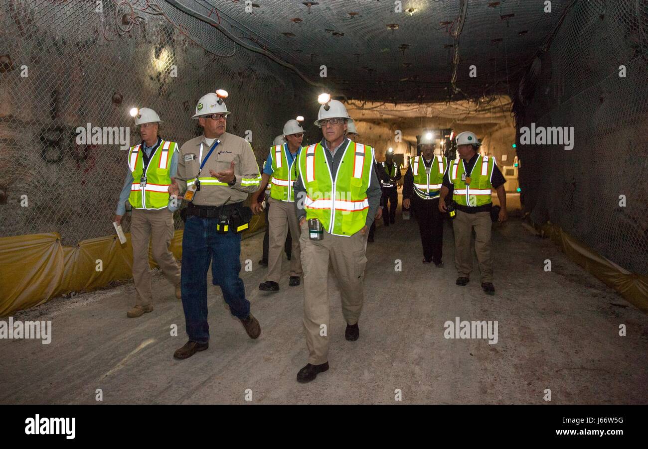 U.S. Secretary of Energy Rick Perry, center, tours the underground Waste Isolation Pilot Plant facility May 17, 2017 in Eunice, New Mexico. The Waste Isolation Pilot Plant, or WIPP, is one of the the largest deep geological repository for radioactive waste left from the research and production of nuclear weapons. Stock Photo