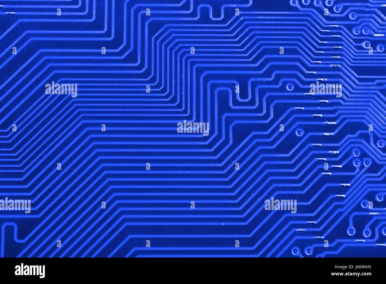 Electronic circuit board as an abstract background pattern. Macro close ...