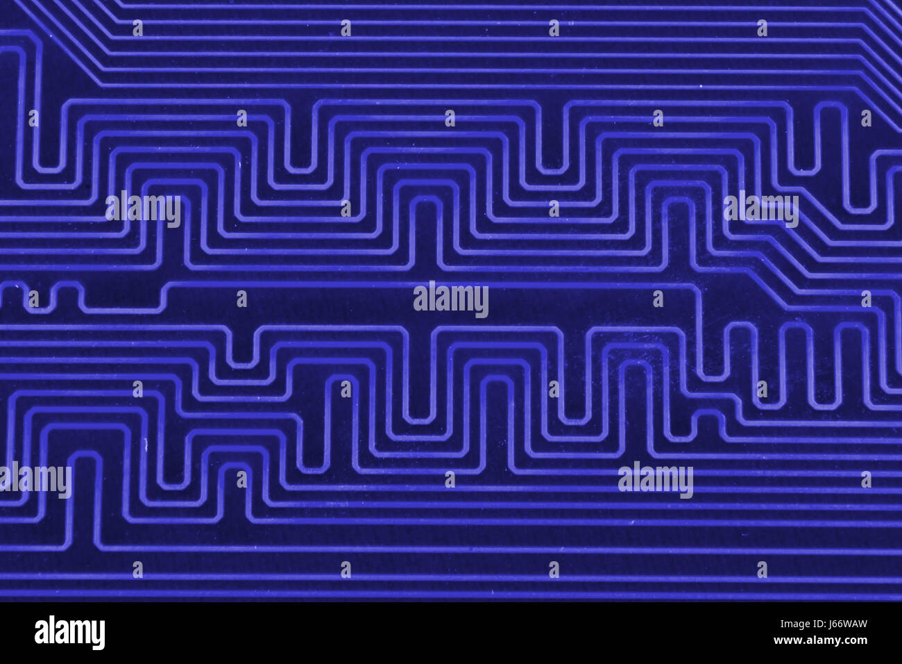 Electronic circuit board as an abstract background pattern. Macro close ...