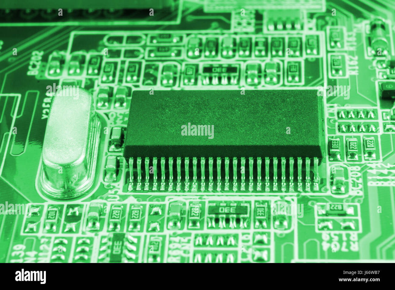 Chip on motherboard mainboard with controllers, ports and wires, close