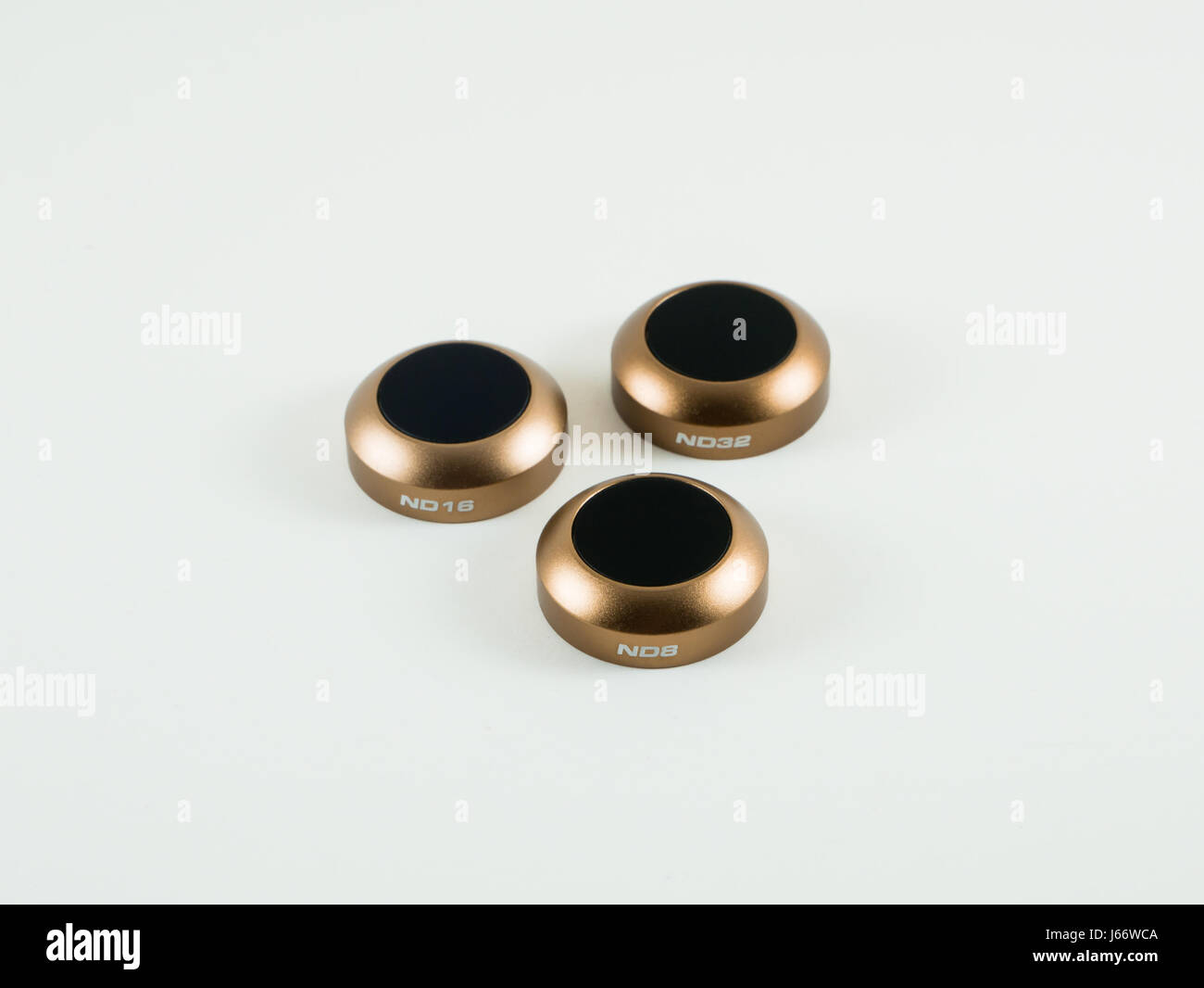 Three Neutral Density filters aligned in the centre of the image Stock Photo