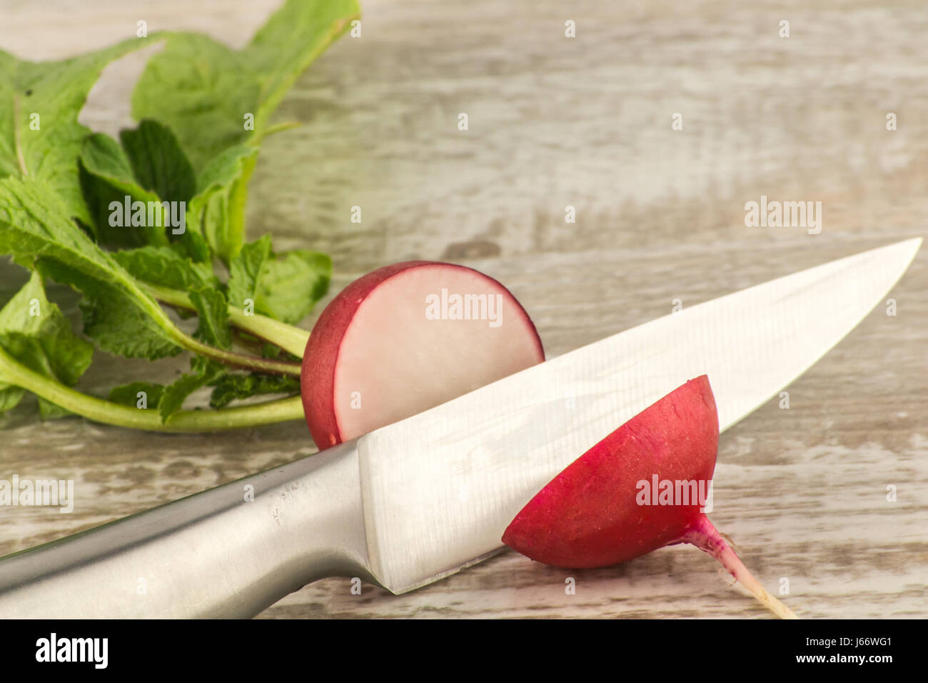 Premium Photo  Watercress salad radish knife on wooden board
