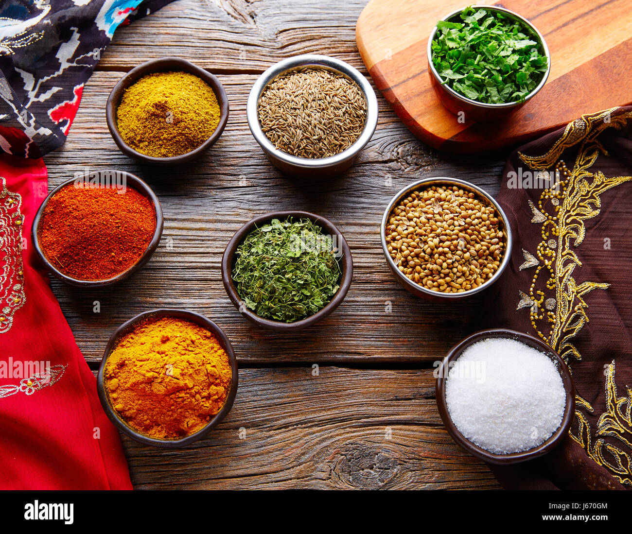 Indian cuisine spices mix as coriander curry cardamom cumin Stock Photo