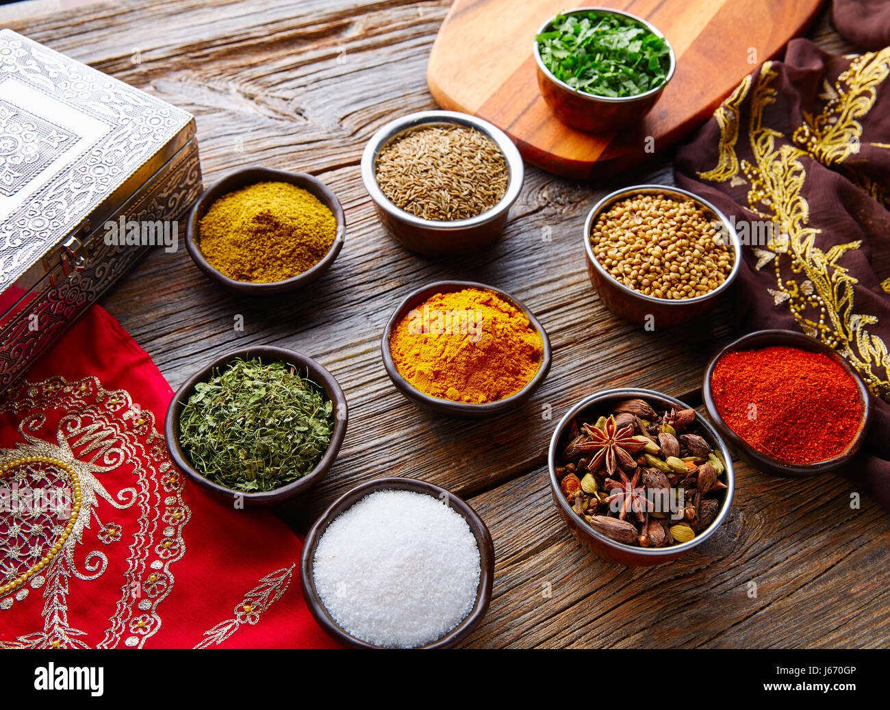 Indian cuisine spices mix as coriander curry cardamom cumin Stock Photo
