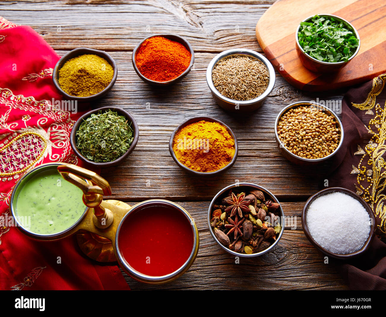 Indian cuisine spices mix as coriander curry cardamom cumin Stock Photo
