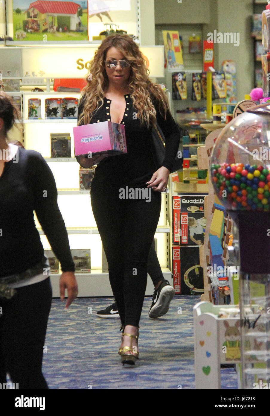 Mariah Carey goes shopping at Tom's Toys with her twins Moroccan and
