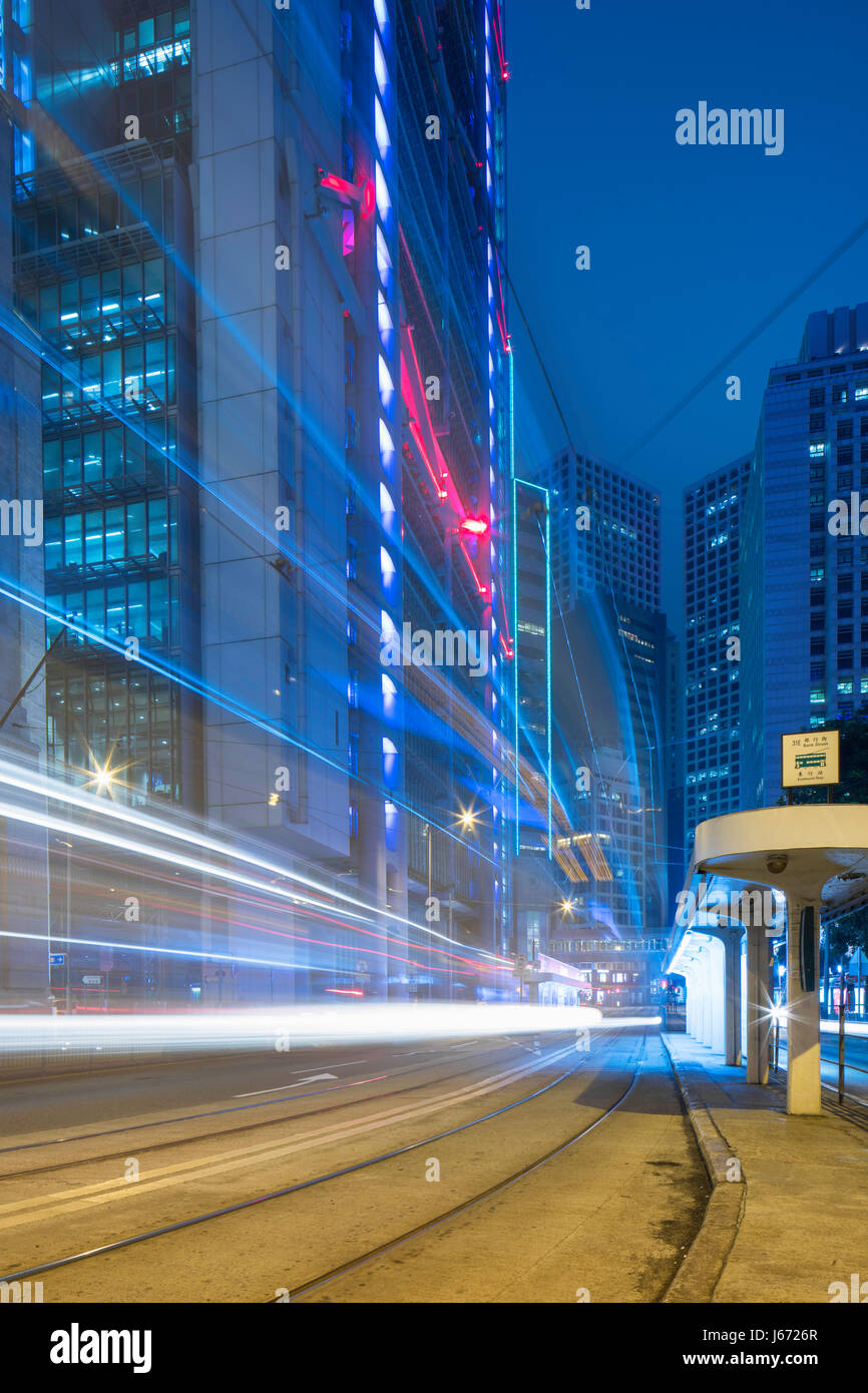 Trams passing Bank of China Building and HSBC Building, Central, Hong Kong, China Stock Photo