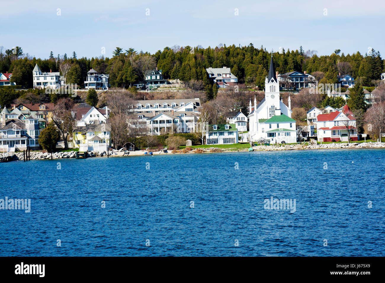 Mackinac Island Michigan,Historic State Parks Park Mackinaw,Straits of,Lake Huron,early spring,shore,shoreline,town,buildings,city skyline,view from w Stock Photo