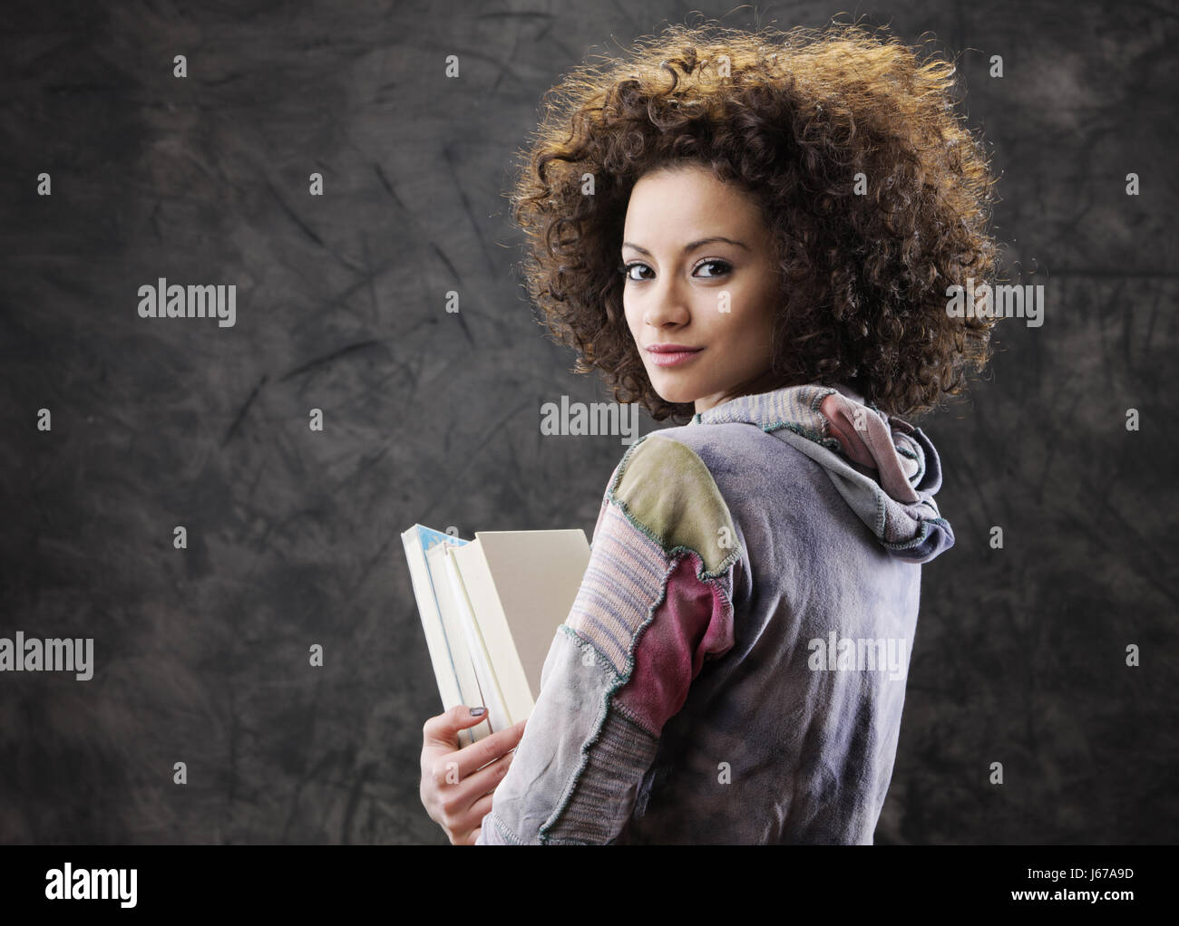 Portrait of beautiful girl student with books Stock Photo - Alamy