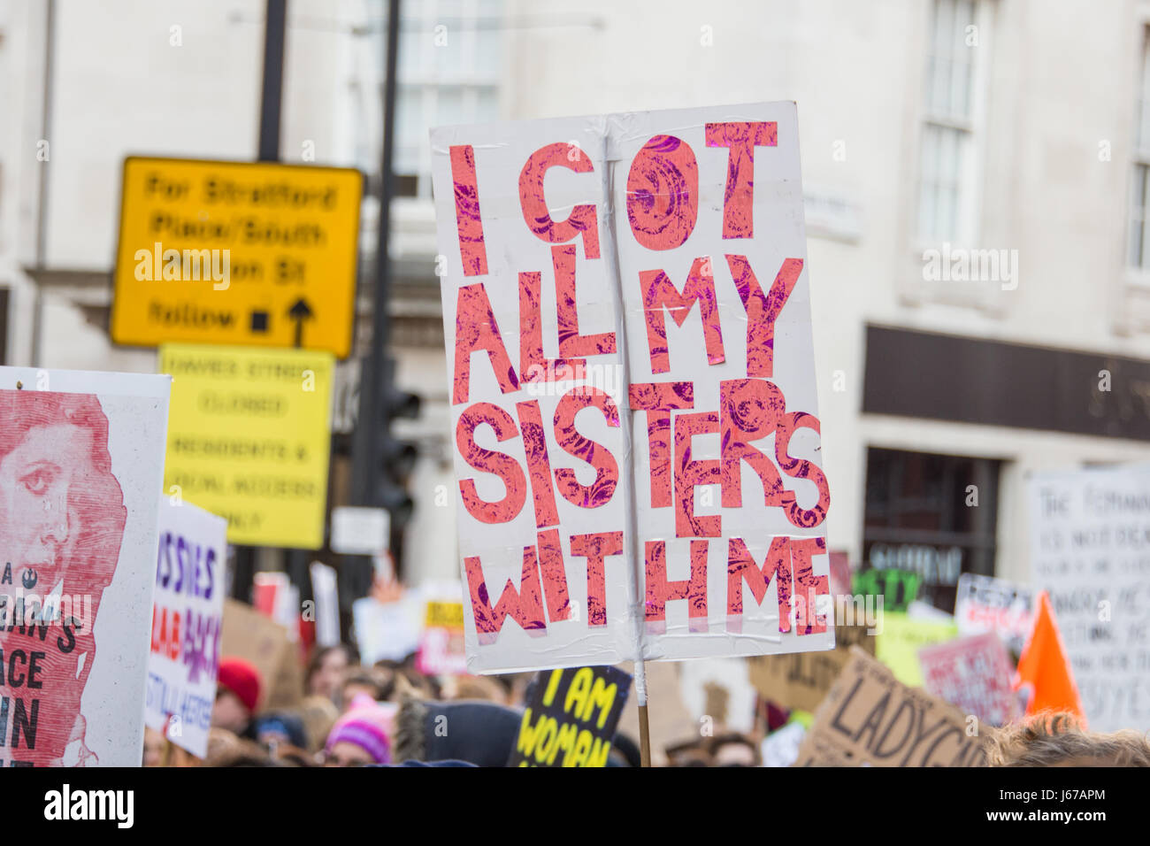 Women's March against Trump, got all my sisters with me sign Stock Photo