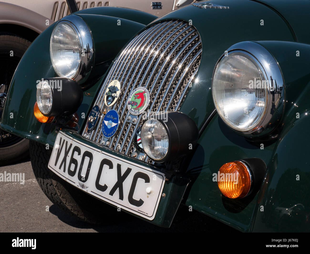 Morgan sports cars parked in the employee parking lot at the Malvern, England Morgan Motor Co. factory. Stock Photo