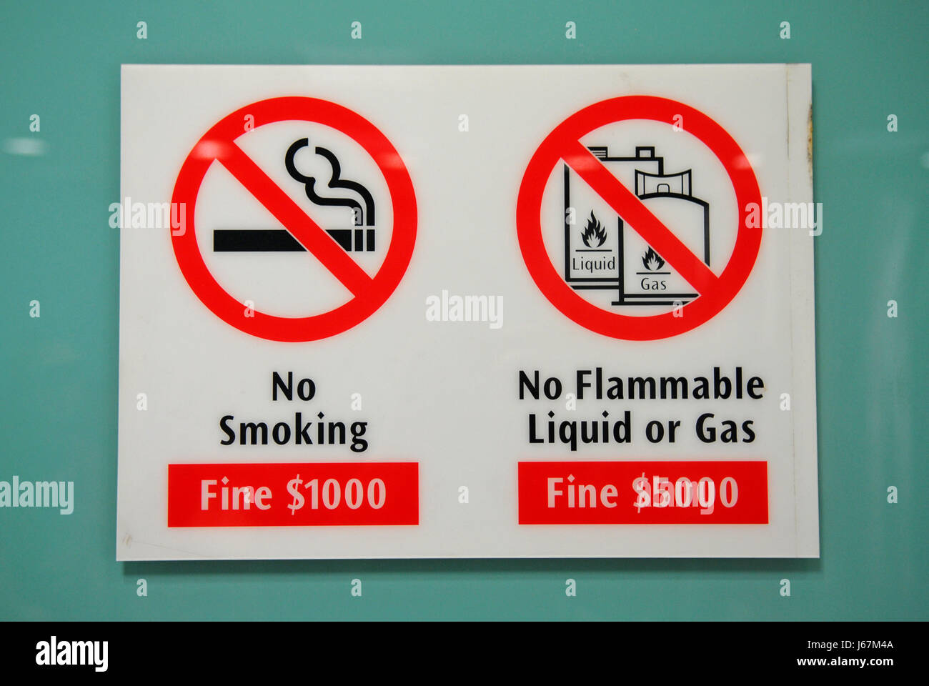 sign signal punishment hint ban smoker whiff smoke smoking pointing sign  signal Stock Photo