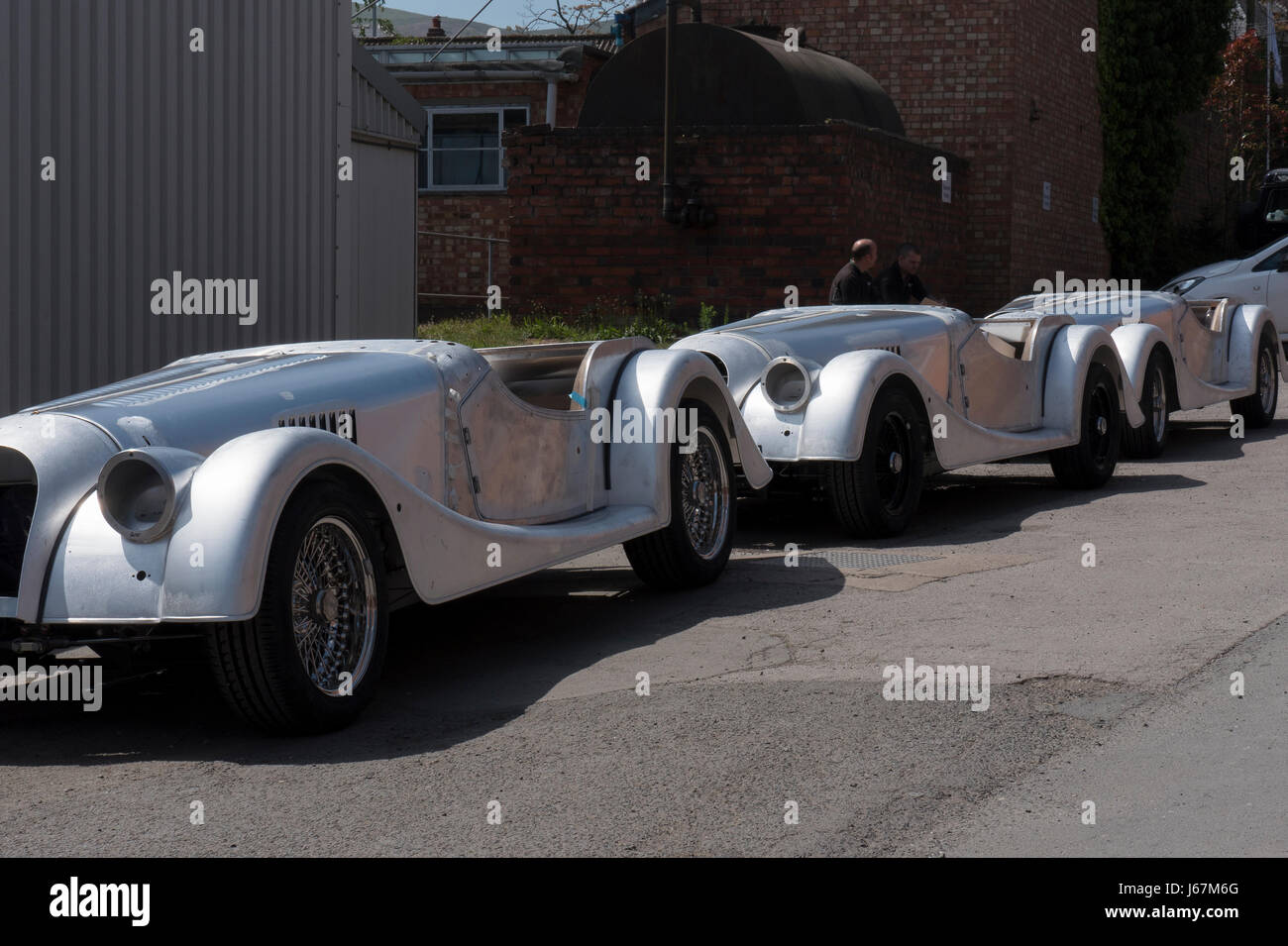 Morgan autos in line awaiting entry into the factory paint shop. Each Morgan is custom hand crafted in Malvern, England to the buyers specifications. Stock Photo