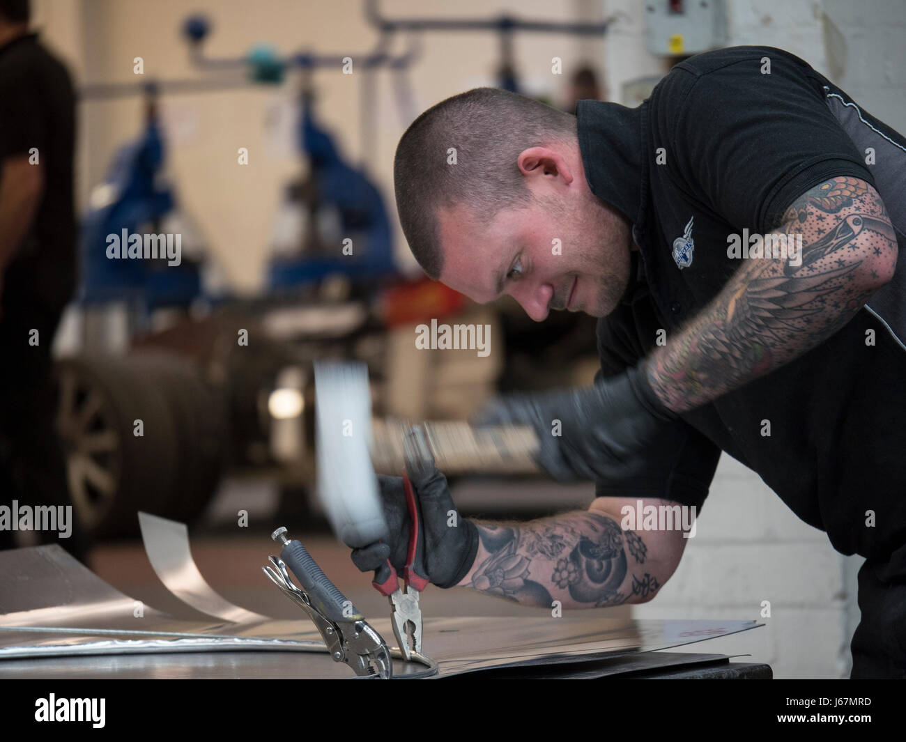 Workers at the Morgan Motor Co. factory in Malvern, England hand build ...