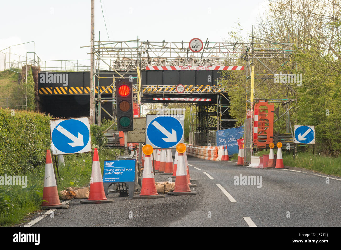 Katrine Aqueduct bridge roadworks on A81 - traffic lights and temporary support works following a vehicle strike in 2017 - bridge to be rebuilt Stock Photo