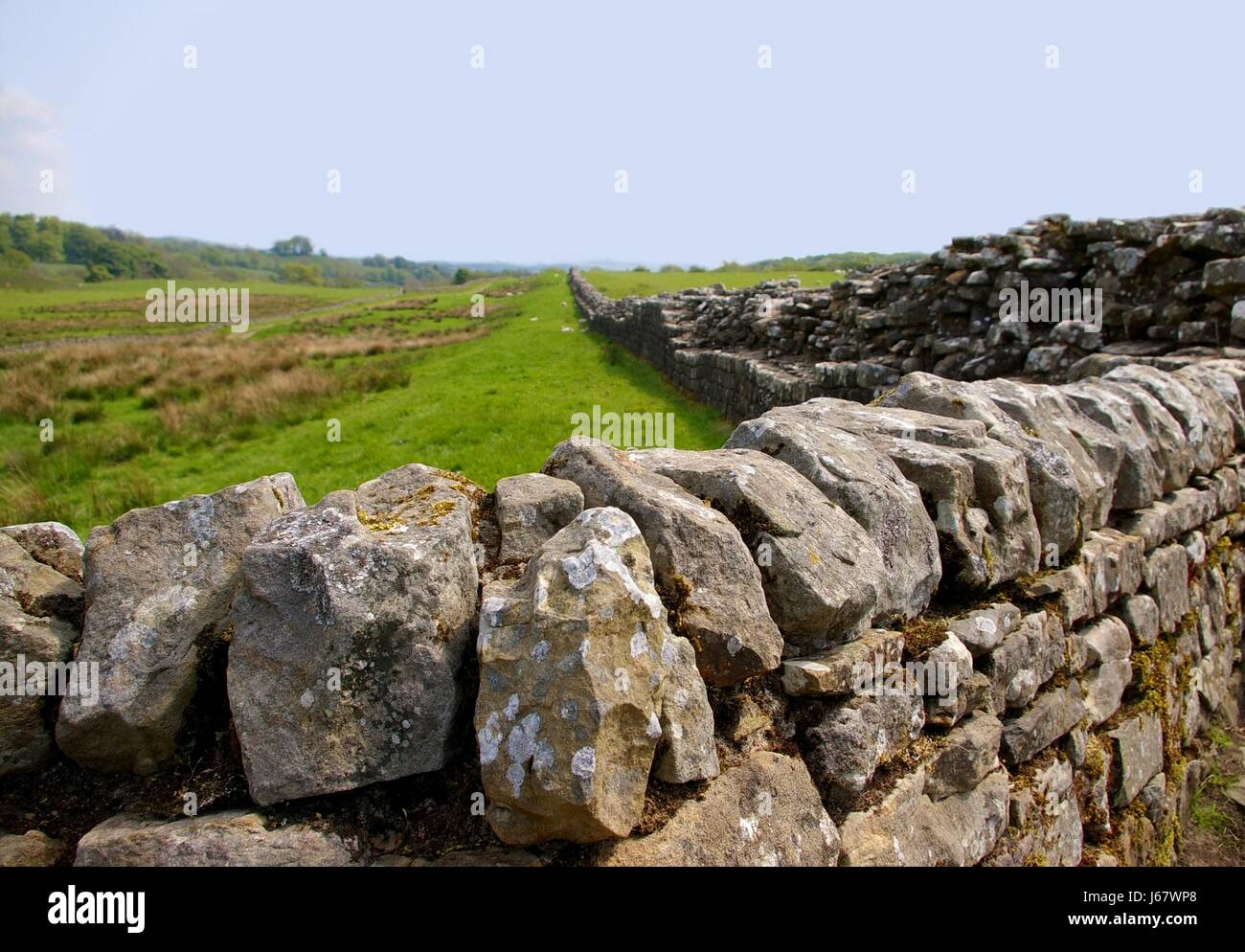 stone wall britain ancient scenery countryside nature historical monument Stock Photo