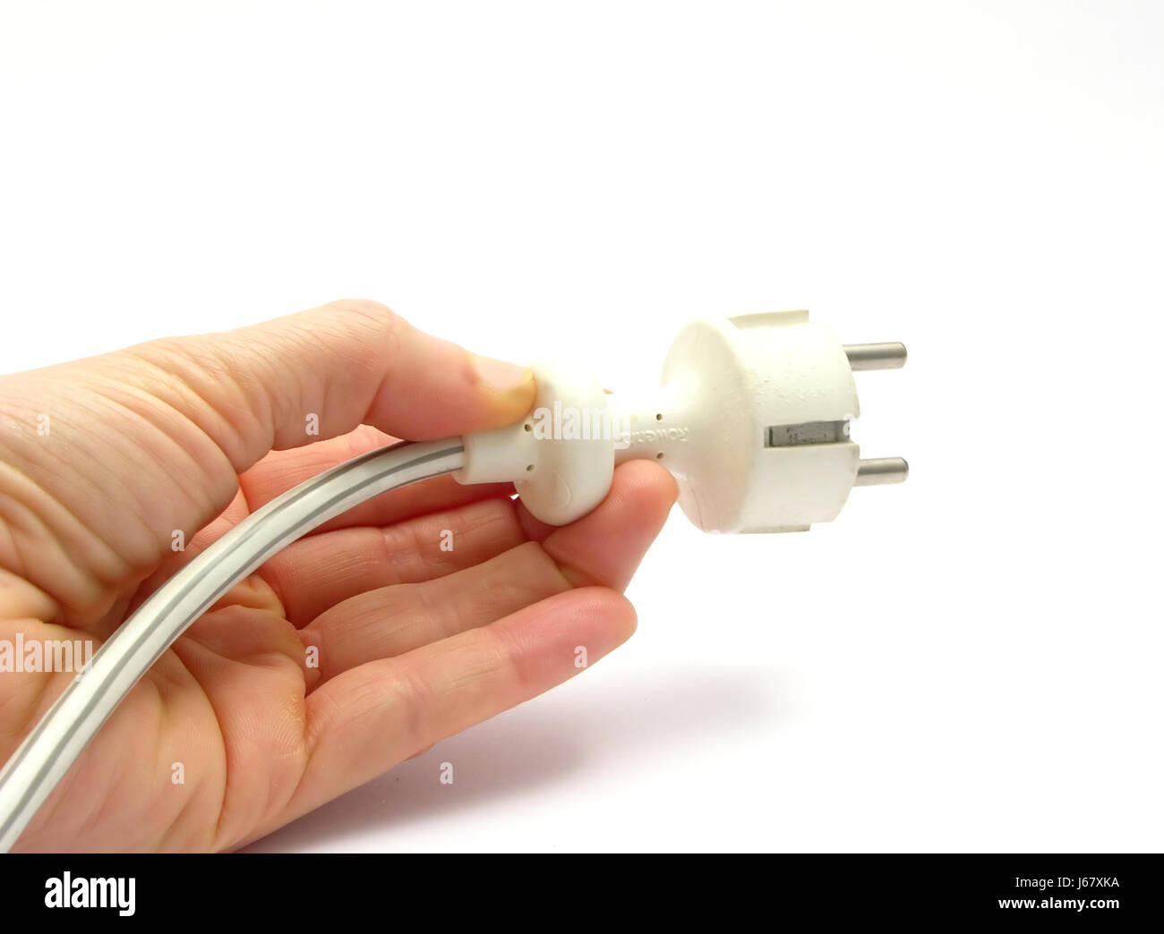 hand with power plug Stock Photo - Alamy