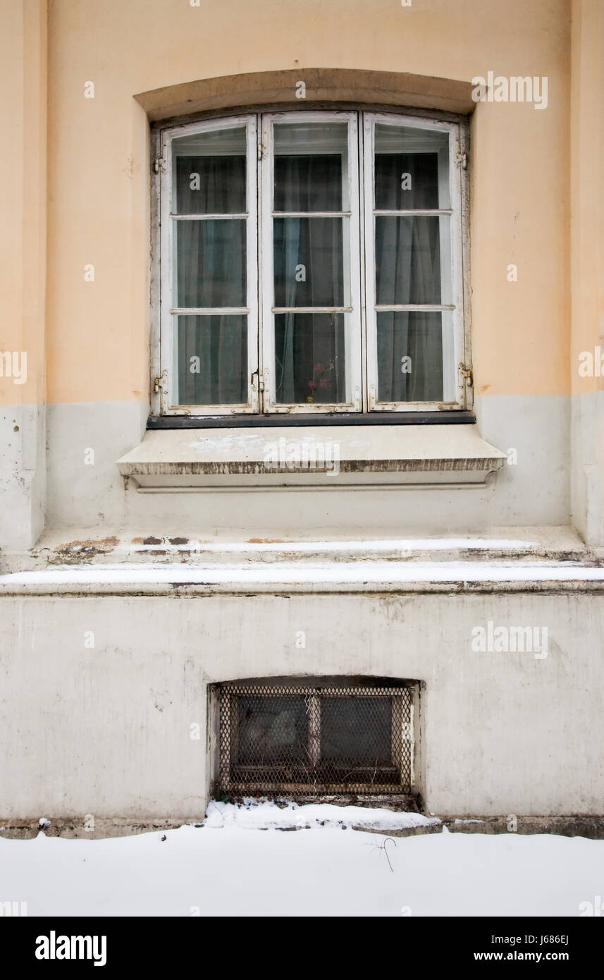 winter window porthole dormer window pane round about arch blank european Stock Photo