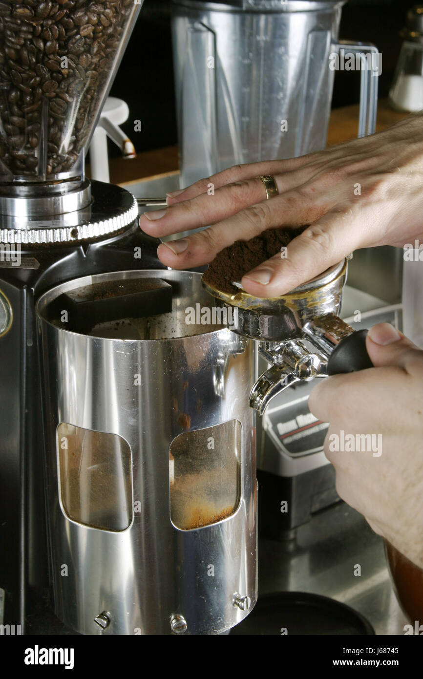 cafe level grind espresso coffee professional bar ground hand barista Stock Photo Alamy