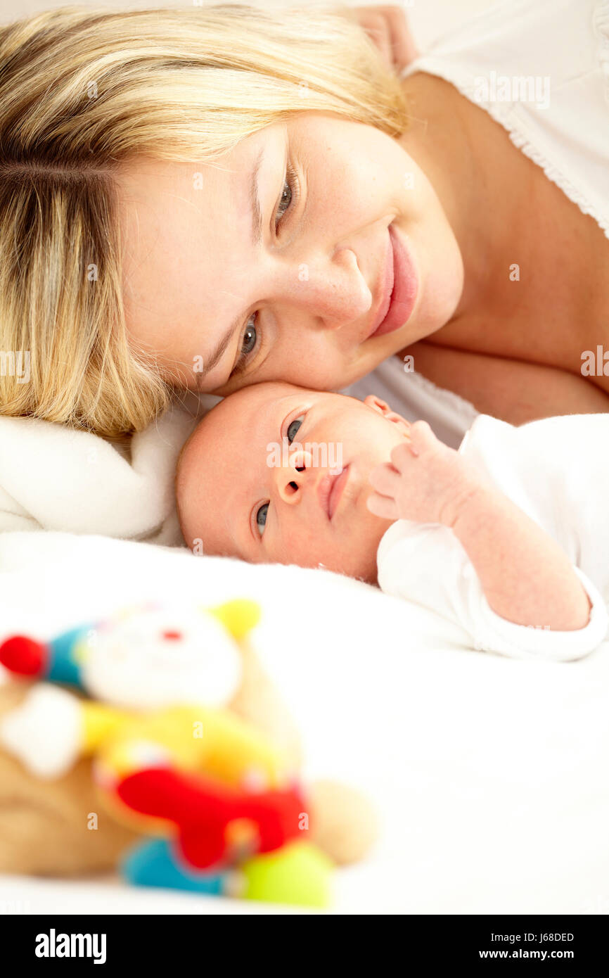 2 weeks old baby with mama Stock Photo - Alamy