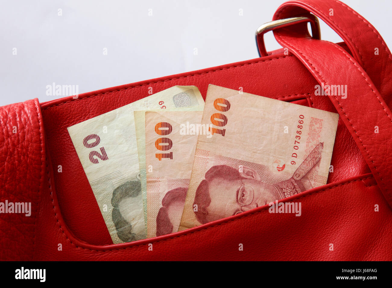 Thai baht cash in a shopping bag. Stock Photo