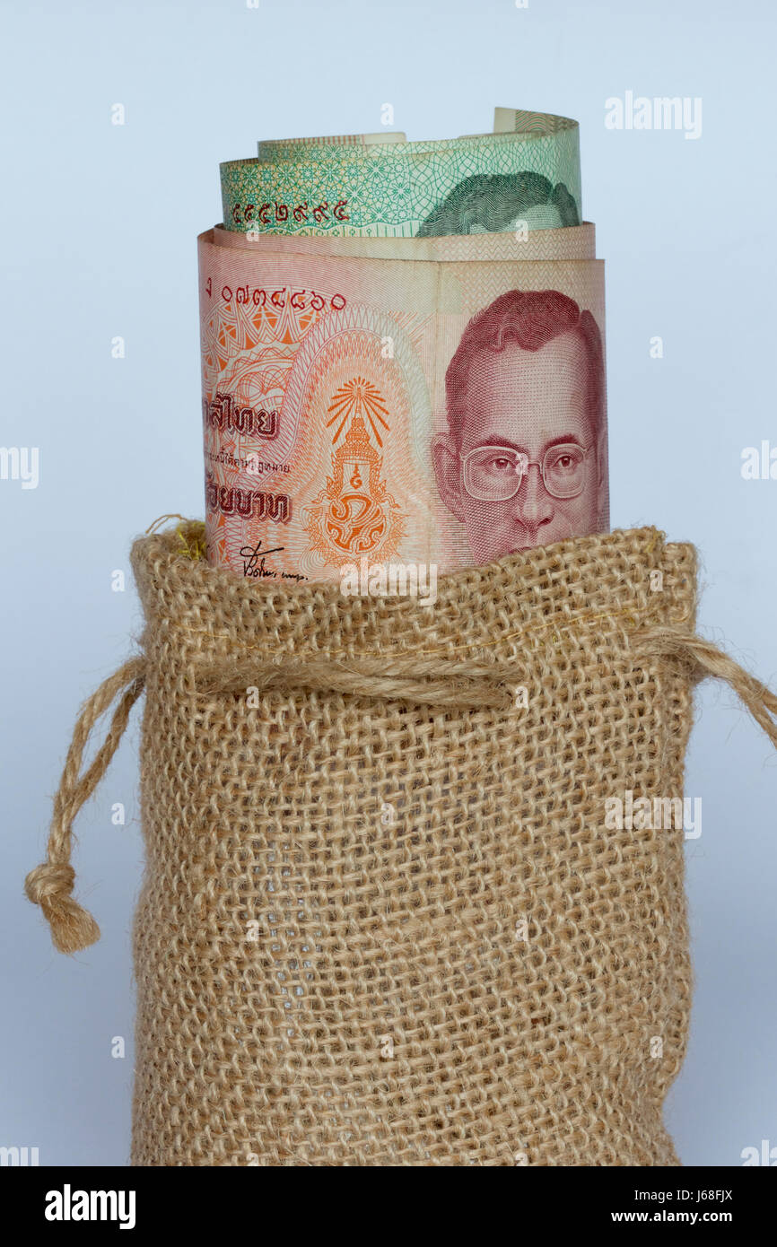 Thai baht money in a bag Stock Photo Alamy