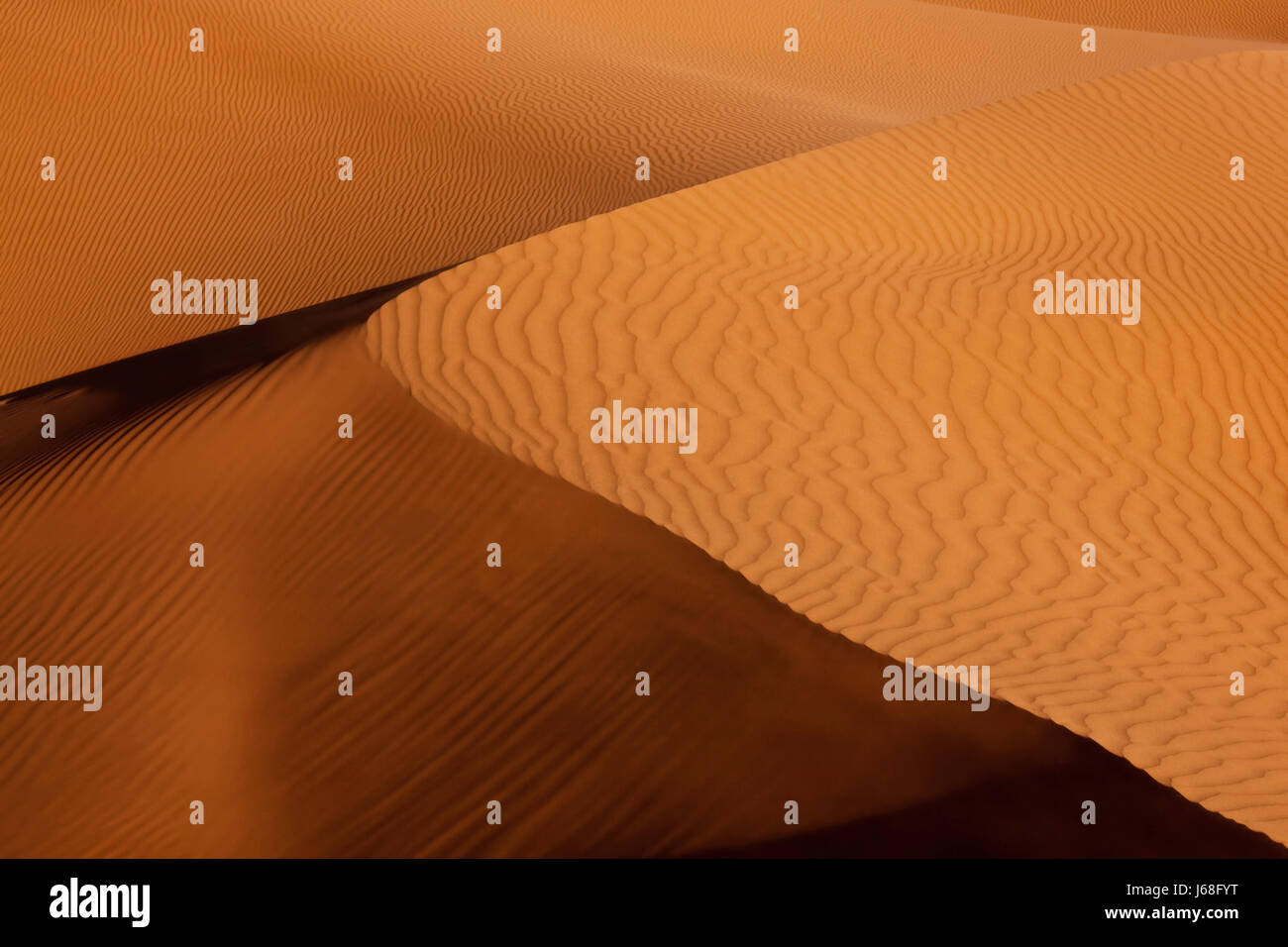 desert wasteland dune pattern backdrop background sands sand texture sunset Stock Photo