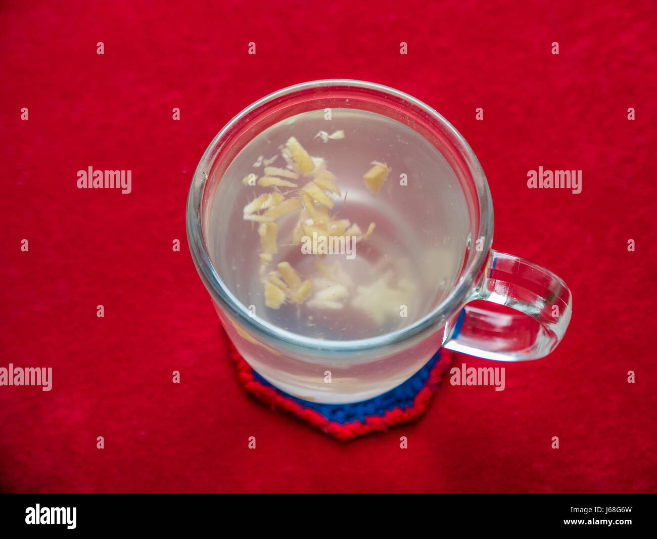 Hot ginger drink made of fresh cut up ginger root Stock Photo Alamy