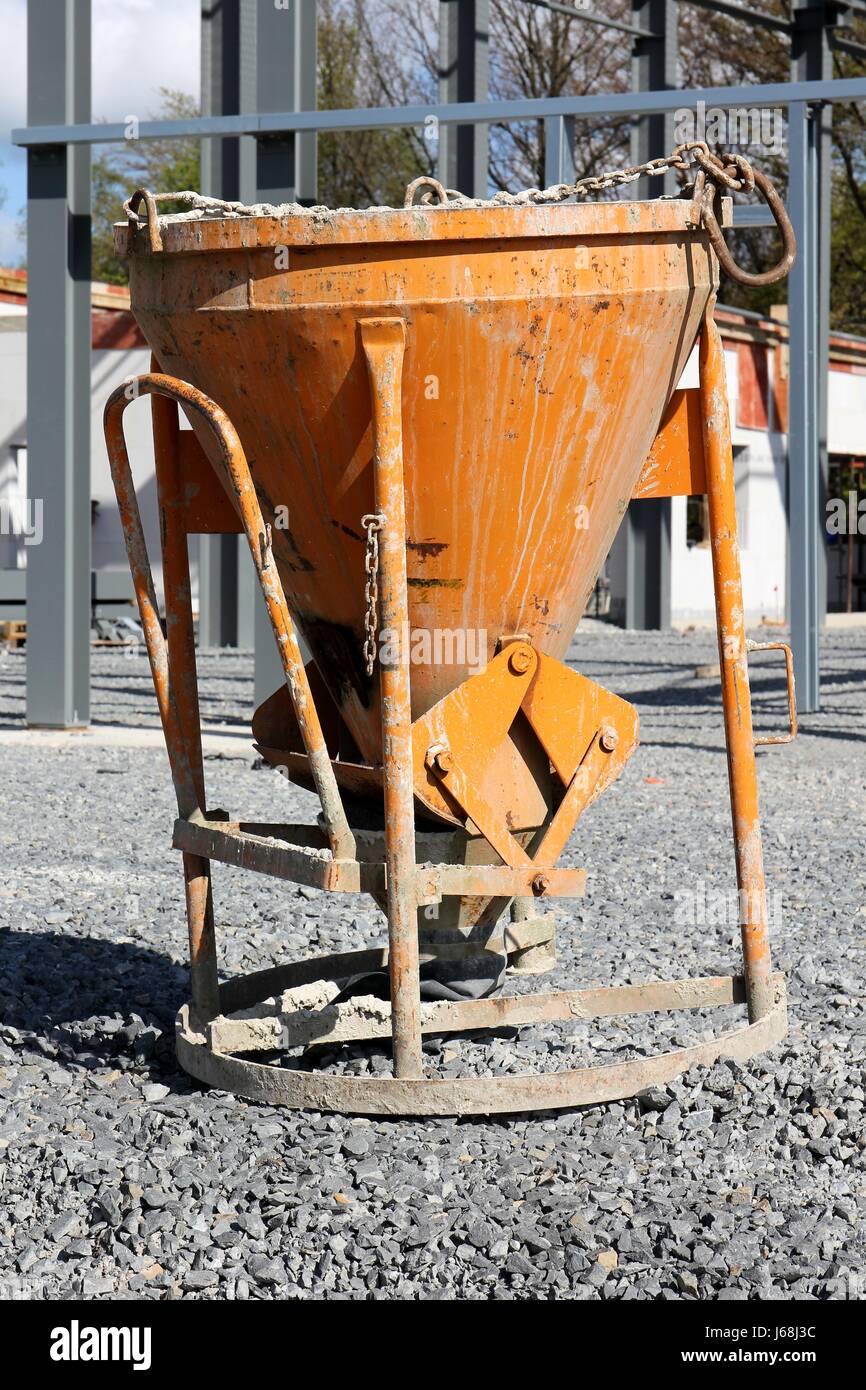 concrete skip at building site Stock Photo - Alamy