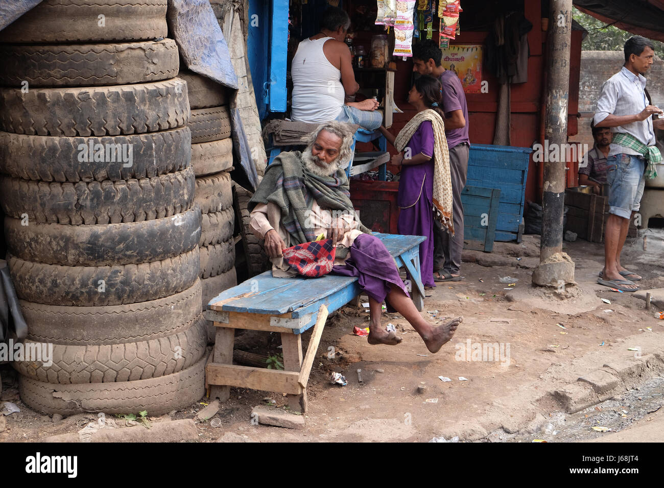 A homeless person on the streets of Topsia, people who can only sustain themselves through begging. Kolkata, India on Fe Stock Photo