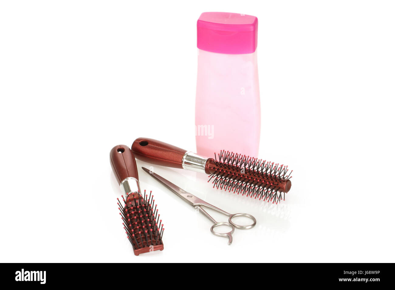brush hairbrush care of the hair brush plastic synthetic material scissors Stock Photo