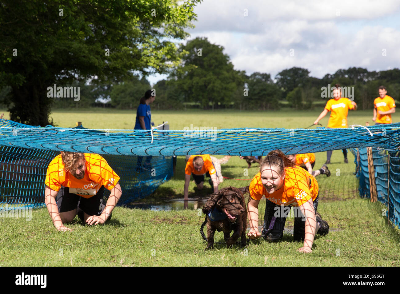 Windsor, UK. 20th May, 2017. Dogs and owners compete in the Muddy Dog