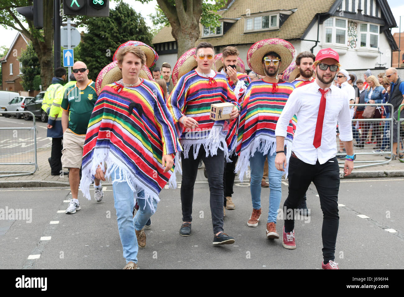 Fans dress up in fancy dress costumes 