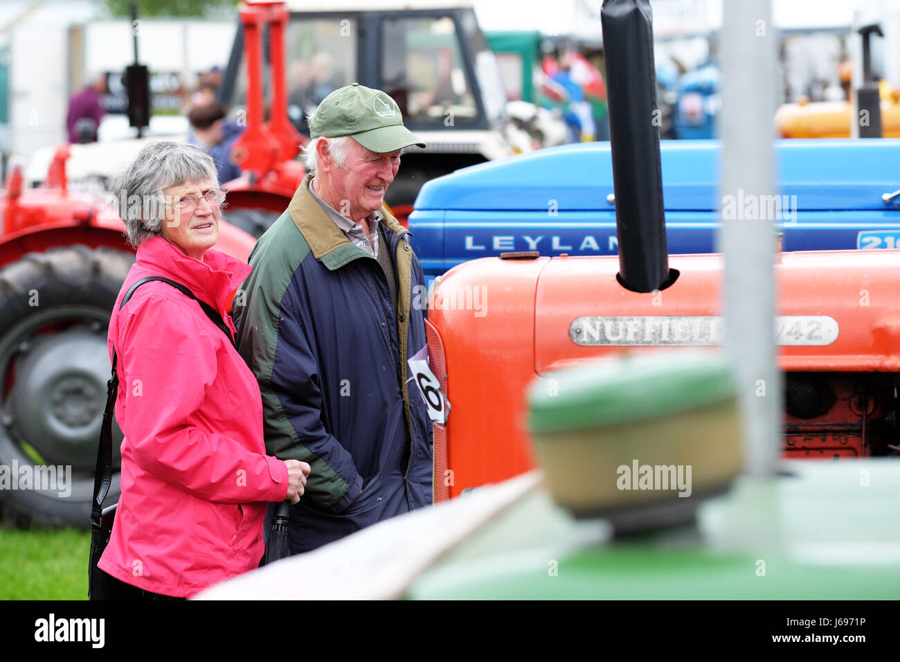 Royal Welsh Spring Festival, Builth Wells, Powys, Wales - May 2017 - Visitors to the show enjoy a walk among the vintage farm tractors at the Royal Welsh Spring Festival. Photo Steven May / Alamy Live News Stock Photo