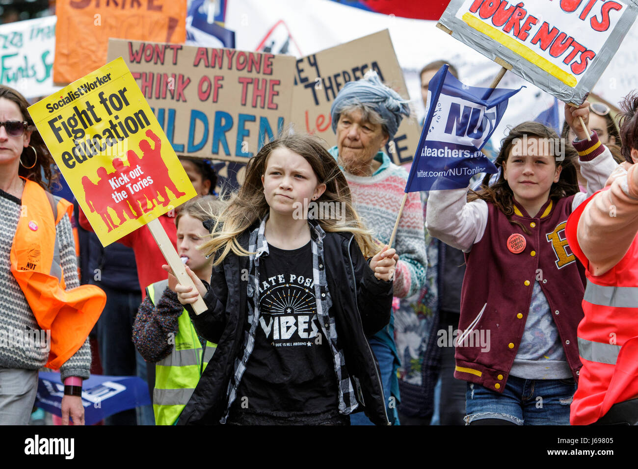 Bristol,UK. 20th May, 2017. Protesters carrying signs and placards are pictured as they march through the streets of Bristol to protest about education cuts,the march was organised by the South West Region of the NUT in response to the huge assault on school funding. Credit: lynchpics/Alamy Live News Stock Photo