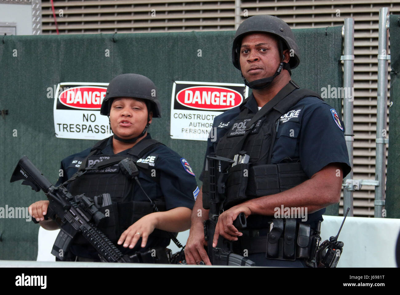 Heavily armed police officers stand hi-res stock photography and images ...