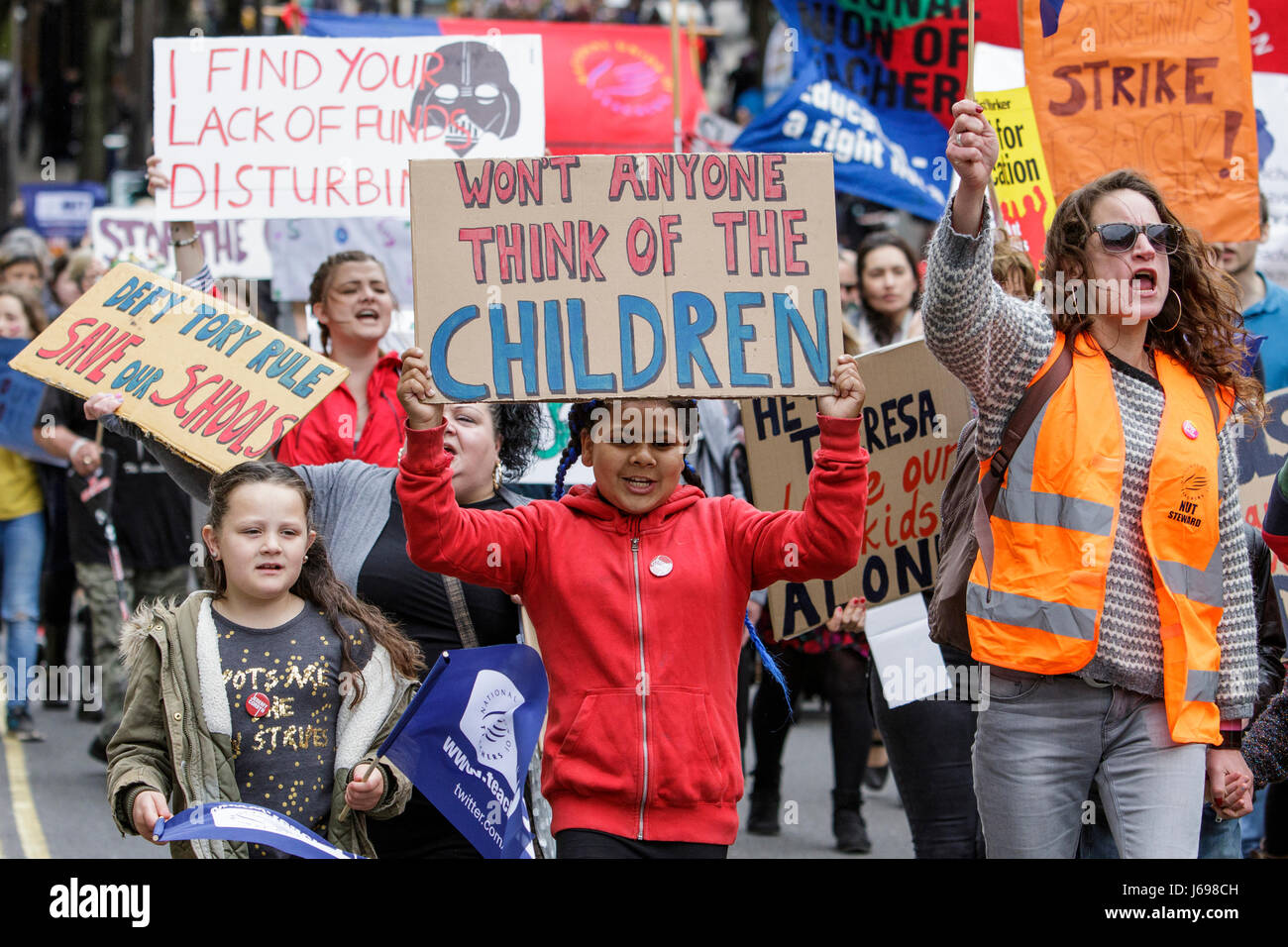 Bristol,UK. 20th May, 2017. Protesters carrying signs and placards are pictured as they march through the streets of Bristol to protest about education cuts,the march was organised by the South West Region of the NUT in response to the huge assault on school funding. Credit: lynchpics/Alamy Live News Stock Photo