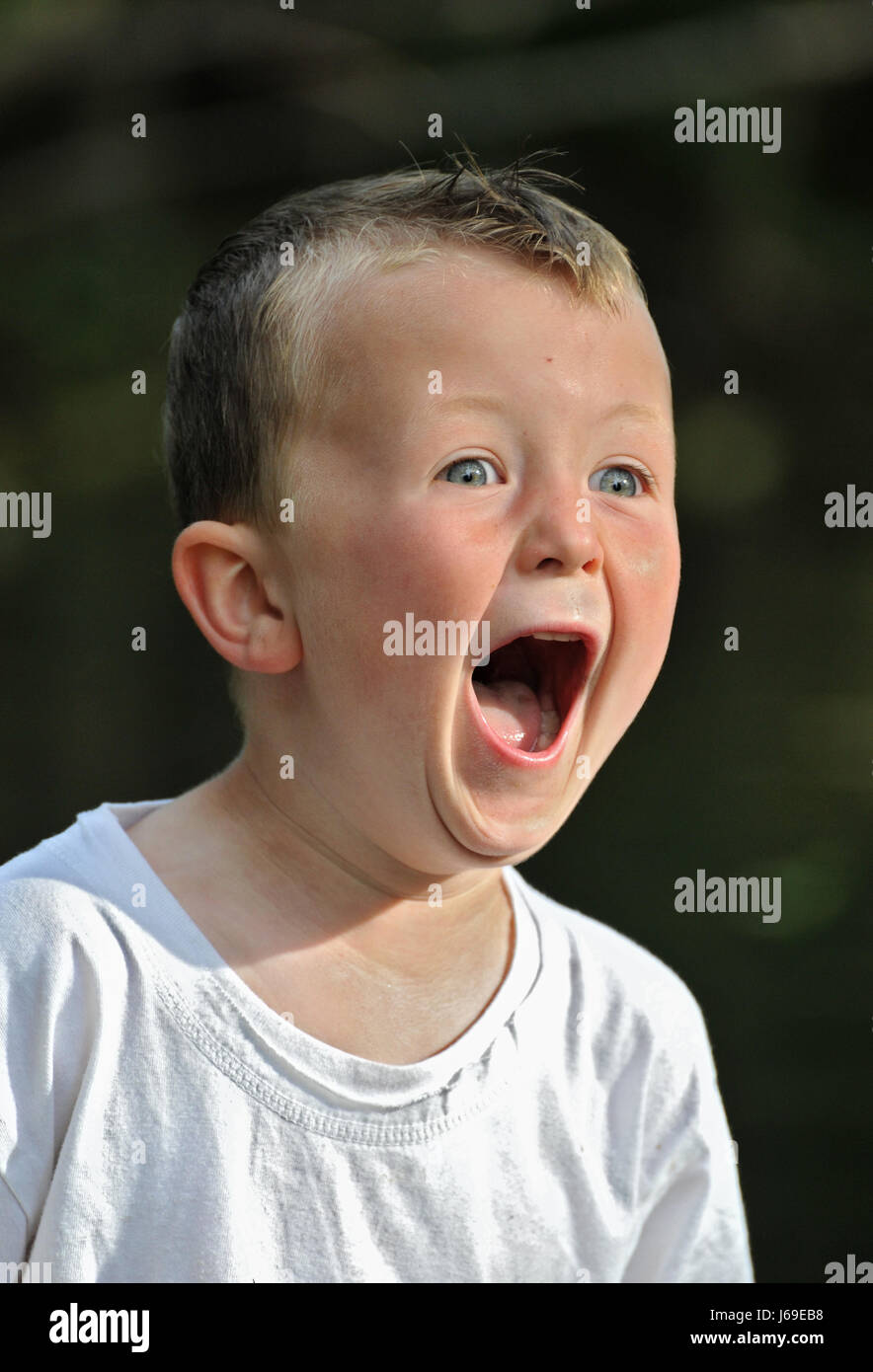 fear shock weep cry crying weeper weeping surprise boy lad male youngster child Stock Photo