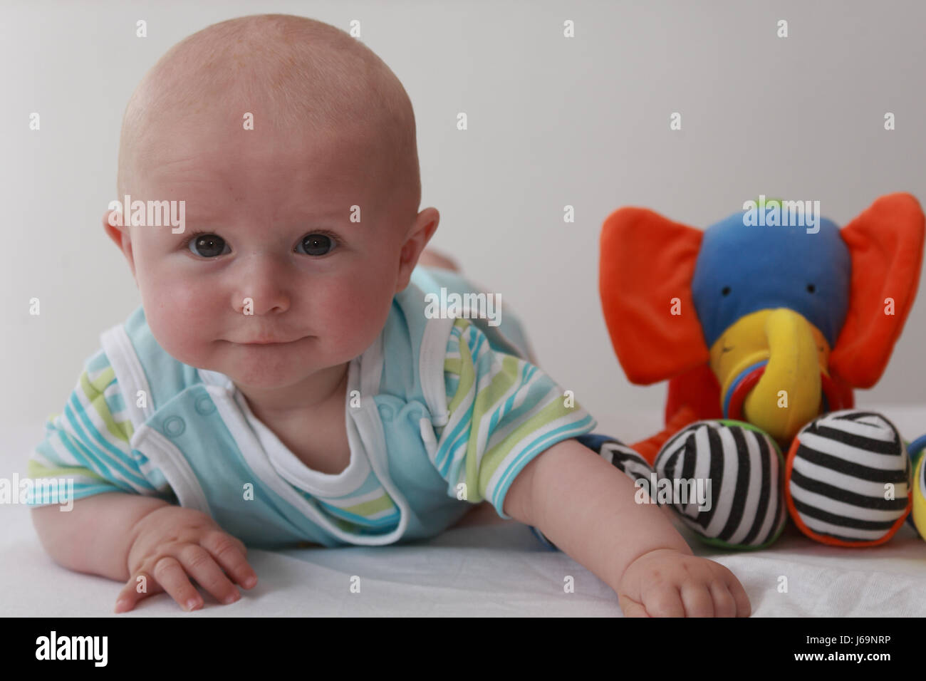 baby with toy Stock Photo - Alamy