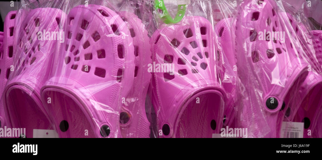purple plastic shoes Stock Photo
