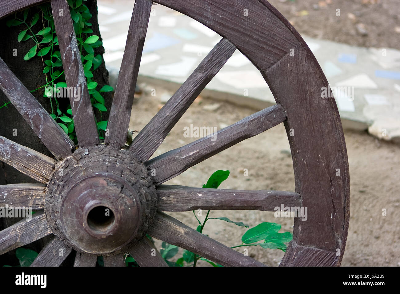 wheel wood axle spoke wheel wood carriage coach decoration retro wooden spindle Stock Photo