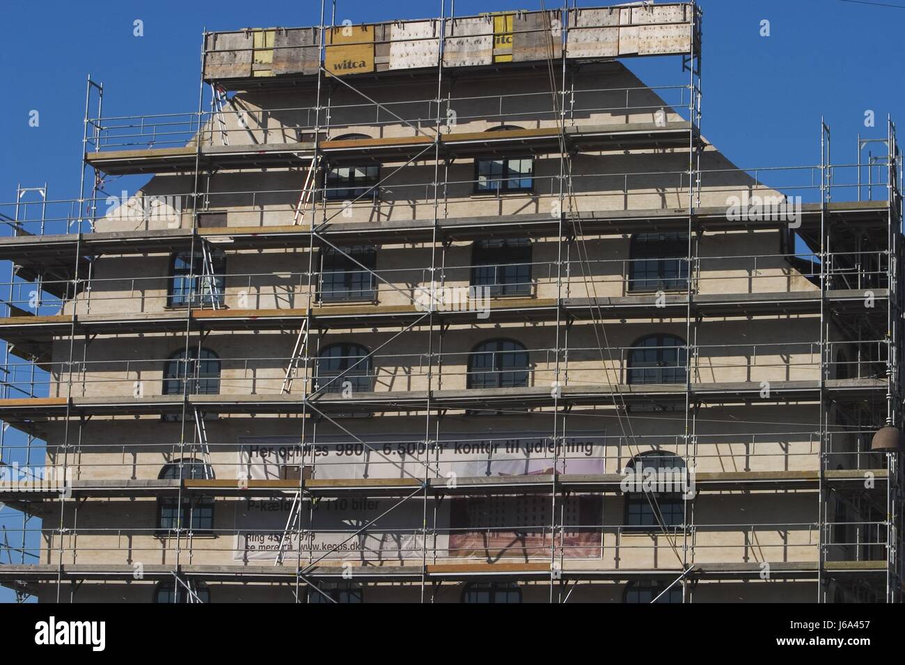 glass chalice tumbler office building office block block of offices