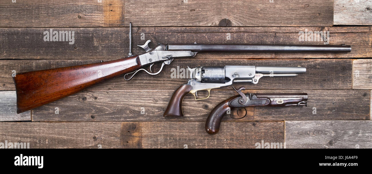 Antique American Civil War era rifle and pistols made from 1840-1863. Stock Photo