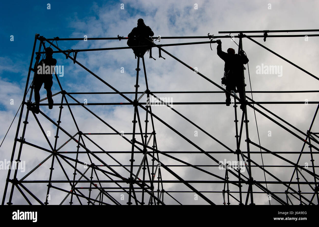 counter-light scaffold scaffolding construction worker counter-light scaffold Stock Photo