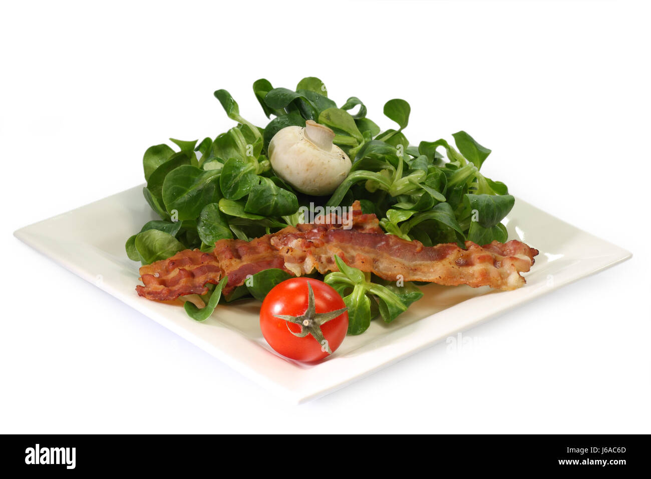 lamb's lettuce salad food aliment rich in vitamins bacon mushroom lamb's Stock Photo
