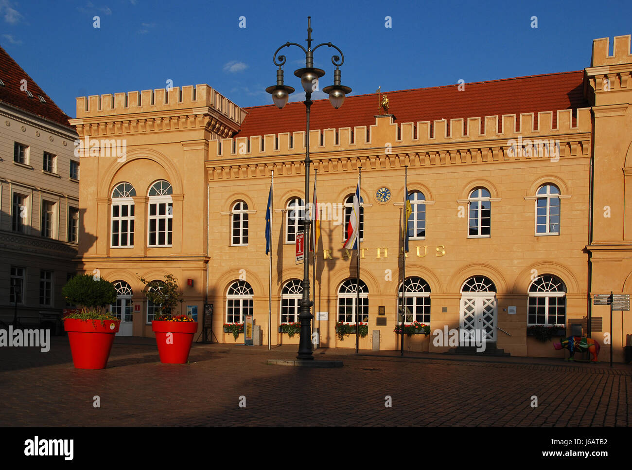 town hall East Germany east bouldering house building town hall evening light Stock Photo