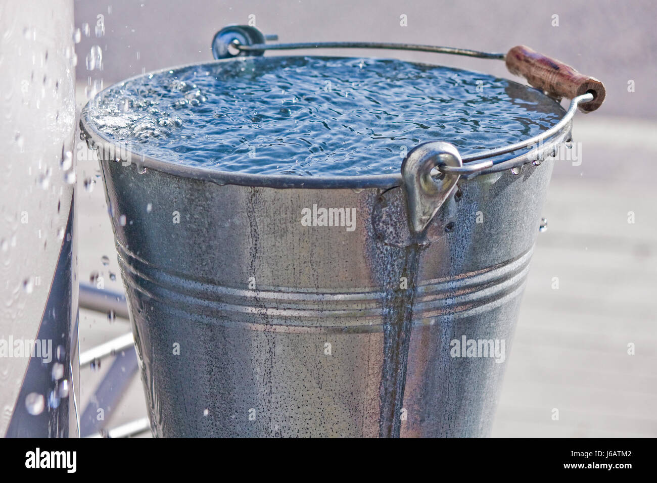 refreshment bucket drinking water water full overflow water drop Stock