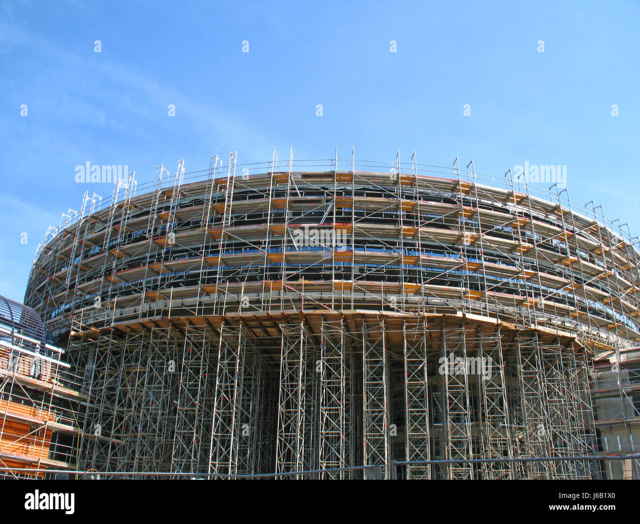 scaffold scaffolding construction site build house multistory building Stock Photo