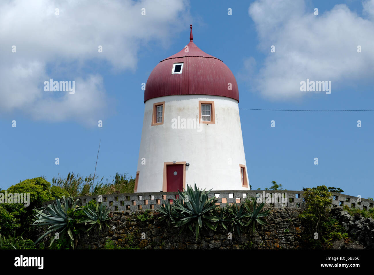 windmill azores blue plant green window porthole dormer window pane shine Stock Photo