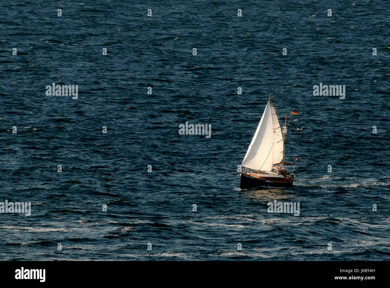 sail small tiny little short sailing ship sailing boat sailboat rowing boat Stock Photo